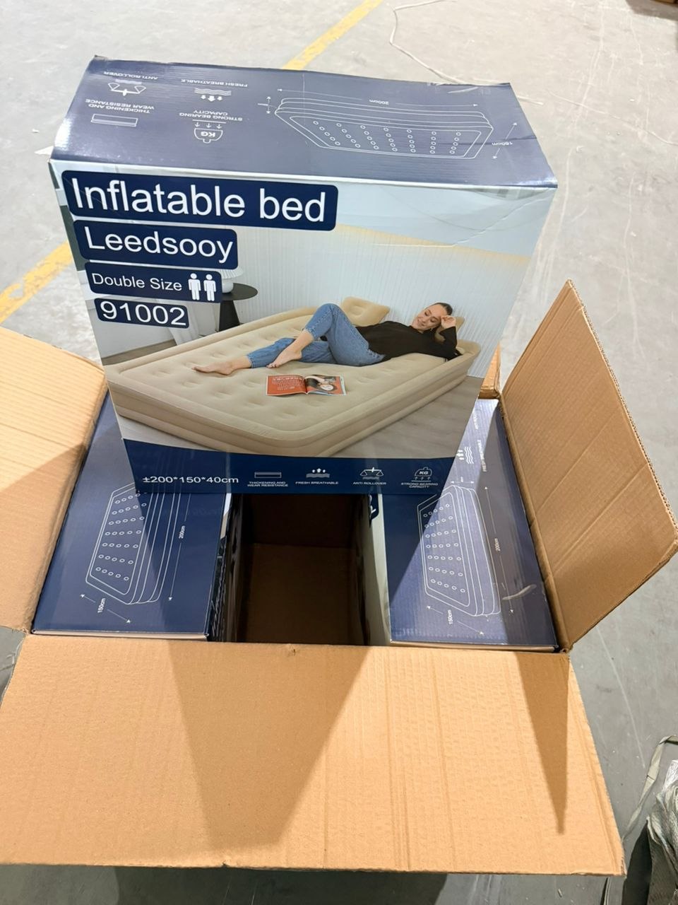 The original inflatable bed in its sealed retail box, ready for delivery